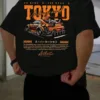 Man wearing the black 'Tokyo Underground' JDM t-shirt with a detailed orange car graphic on the back.